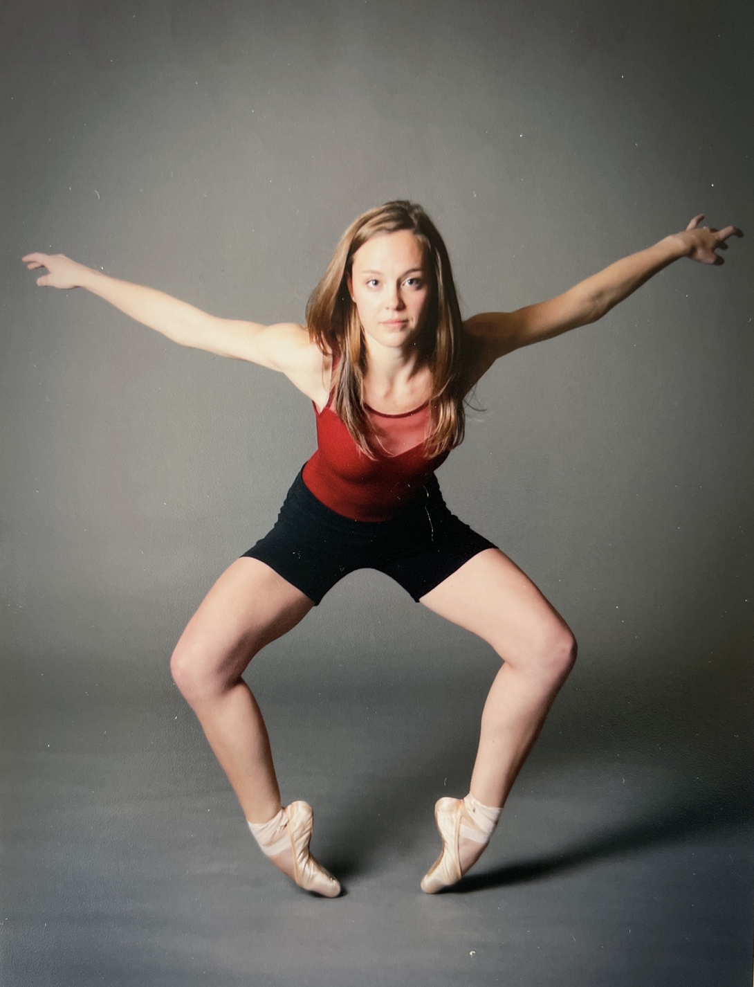 A dancer en pointe in a contemporary pose.